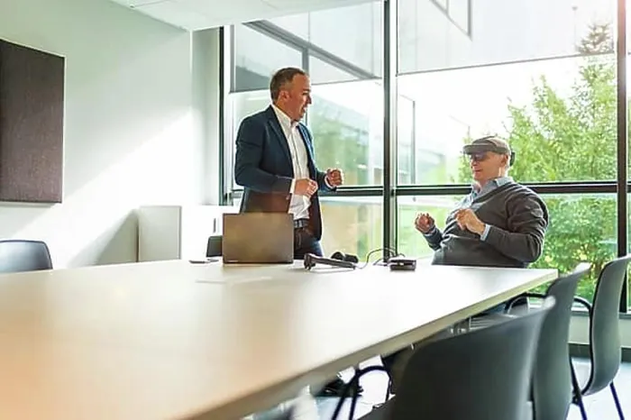 Framed Print : Aged businessmen reflecting the imaginary world with virtual reality in the office Framed Print : Aged businessmen reflecting the imaginary world with virtual reality in the office