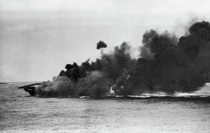 Framed Print : Aircraft Carrier Survives 'One-Two' Punch -- Hit and set aflame by Jap suiced planes Framed Print : Aircraft Carrier Survives 'One-Two' Punch -- Hit and set aflame by Jap suiced planes