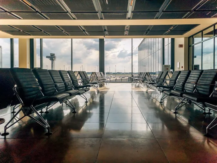 Framed Print : Empty airport departure area lounge on the background of the window Framed Print : Empty airport departure area lounge on the background of the window