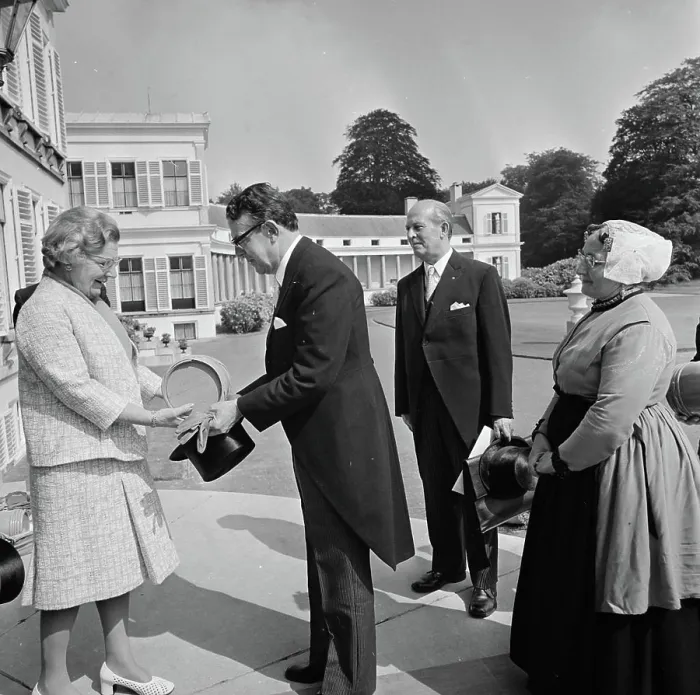 Framed Print : Anefo photo collection. Queen Juliana gets Vaat Haring offered at Soestdijk Palace by woman in traditional costume Framed Print : Anefo photo collection. Queen Juliana gets Vaat Haring offered at Soestdijk Palace by woman in traditional costume