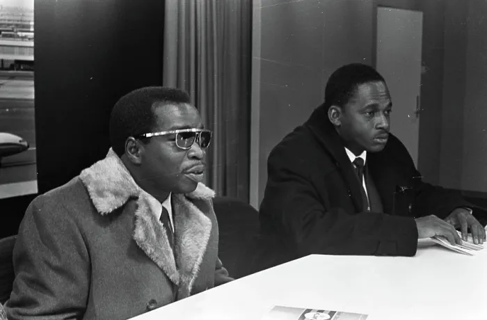 Framed Print : Anefo photo collection. Two Surinamese teachers at Schiphol during press conference left F Framed Print : Anefo photo collection. Two Surinamese teachers at Schiphol during press conference left F