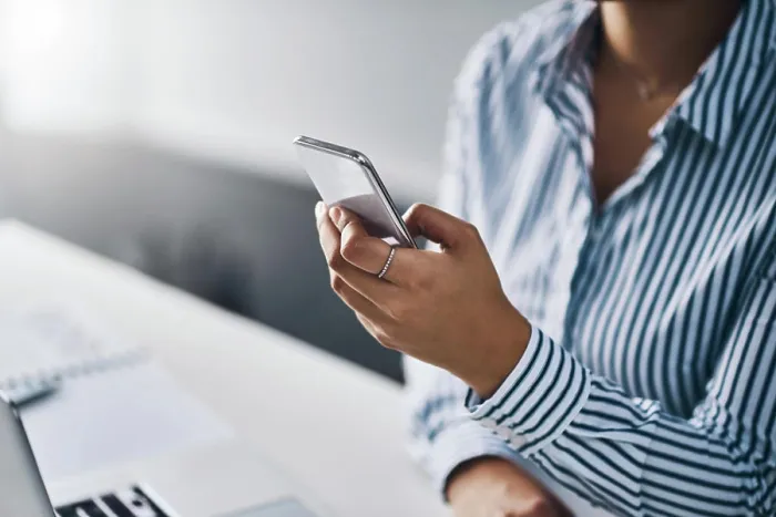 Framed Print : App, business and phone in hand of woman at office for communication Framed Print : App, business and phone in hand of woman at office for communication