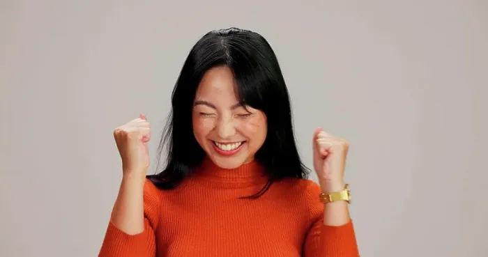 Framed Print : Asian woman, fist and celebration in studio Framed Print : Asian woman, fist and celebration in studio