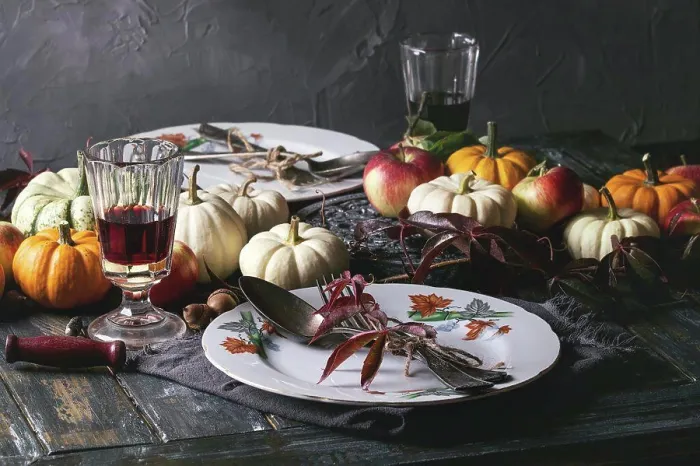 Framed Print : Autumn holiday table decoration setting with decorative pumpkins