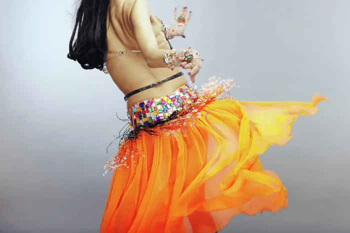 Framed Print : Backside of the belly dancer Backside of the belly dancer in traditional orange dress Framed Print : Backside of the belly dancer Backside of the belly dancer in traditional orange dress