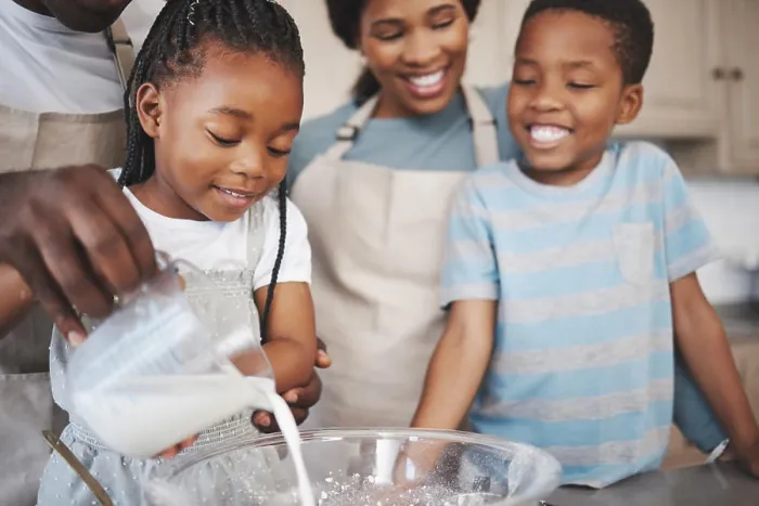 Framed Print : Baking, milk and black family in kitchen for bonding