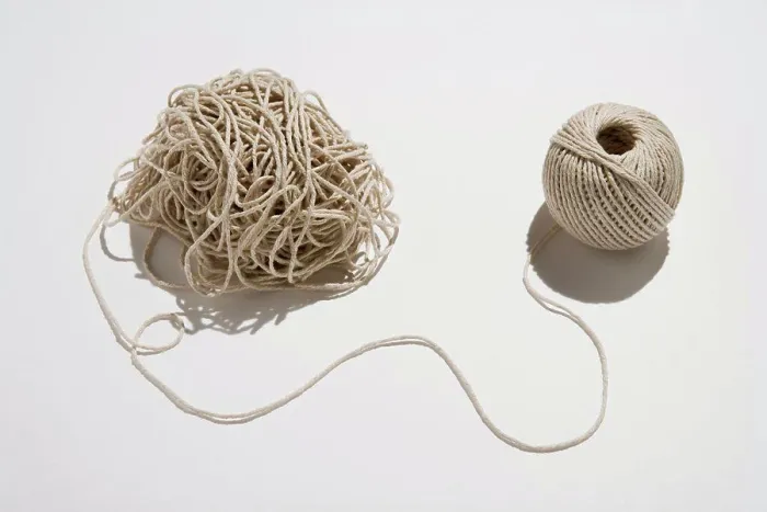 Framed Print : Ball of twine unraveling Framed Print : Ball of twine unraveling