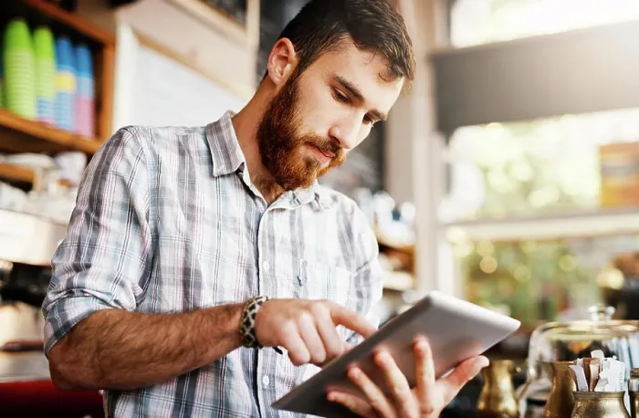 Framed Print : Barista, man and tablet for cafe menu or online order on website in startup coffee shop Framed Print : Barista, man and tablet for cafe menu or online order on website in startup coffee shop