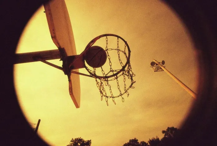 Framed Print : Basketball falling through a hoop Framed Print : Basketball falling through a hoop