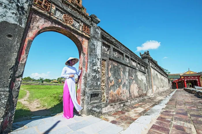 Framed Print : beautiful woman exploring the imperial palace in Hue / Vietnam Framed Print : beautiful woman exploring the imperial palace in Hue / Vietnam