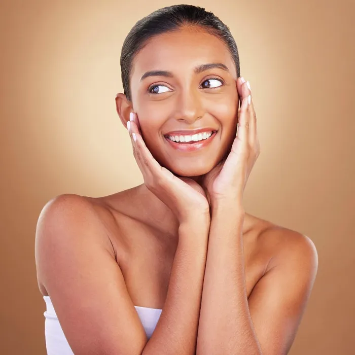 Framed Print : Beauty, skincare and touch with indian woman in studio for happy Framed Print : Beauty, skincare and touch with indian woman in studio for happy