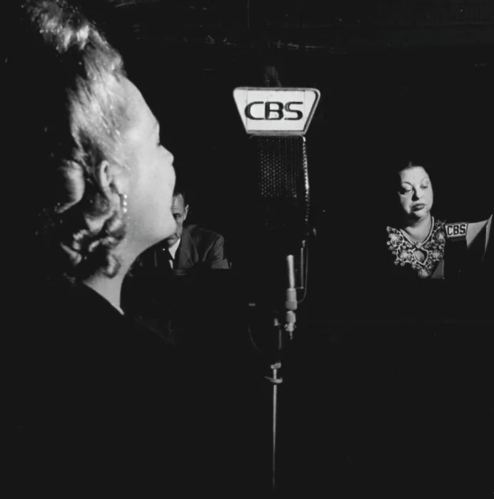 Framed Print : Bessie Mack, right, listens from control booth as model Helen Manning auditions with The Man I Love. March 25, 1948 Framed Print : Bessie Mack, right, listens from control booth as model Helen Manning auditions with The Man I Love. March 25, 1948