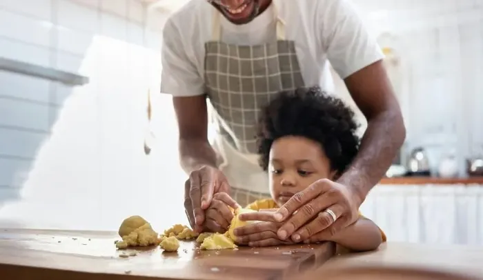 Framed Print : Black family having fun prepare bakery together at home