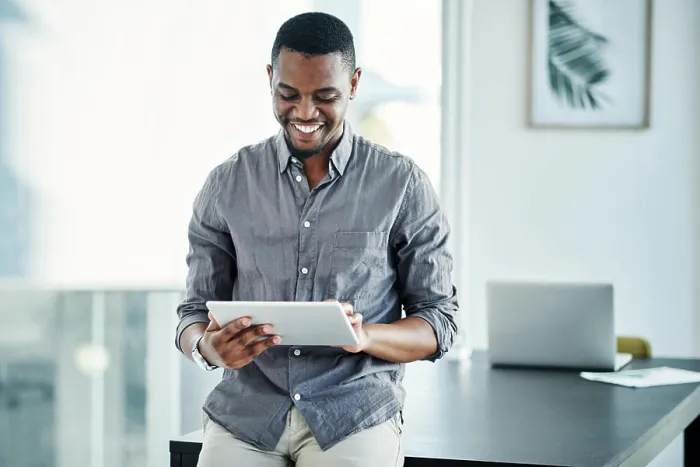 Framed Print : Black man, tablet and happy in office for professional career Framed Print : Black man, tablet and happy in office for professional career