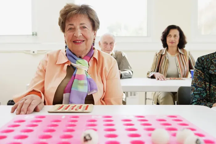 Framed Print : BLD016376. Elderly woman playing bingo Framed Print : BLD016376. Elderly woman playing bingo