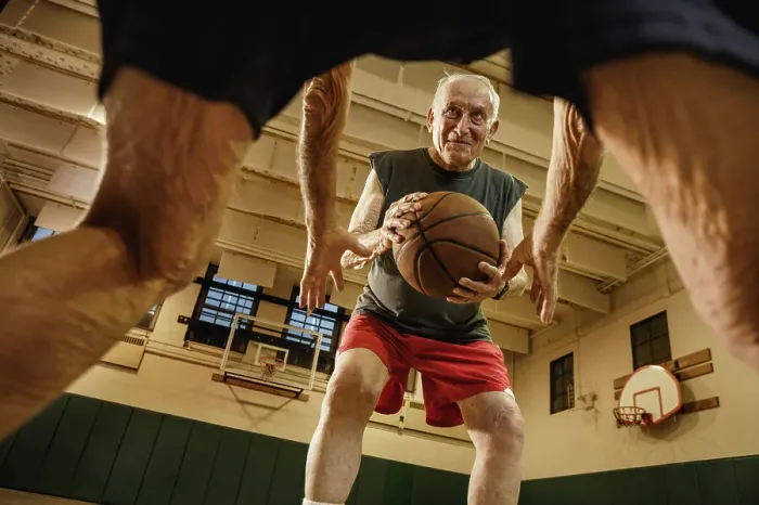 Framed Print : BLD016440. Elderly men playing basketball