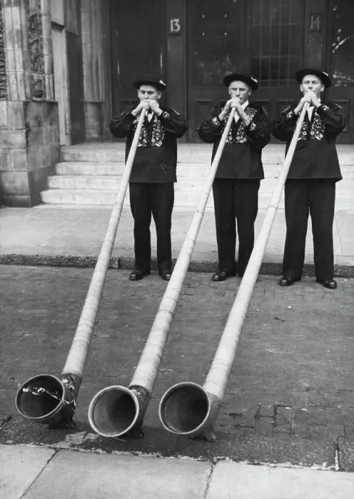 Framed Print : Blowing Their Own Trumpets! -- Swiss mountaineers demonstrating their skill on the 12 feet long wooden alp-horns Framed Print : Blowing Their Own Trumpets! -- Swiss mountaineers demonstrating their skill on the 12 feet long wooden alp-horns