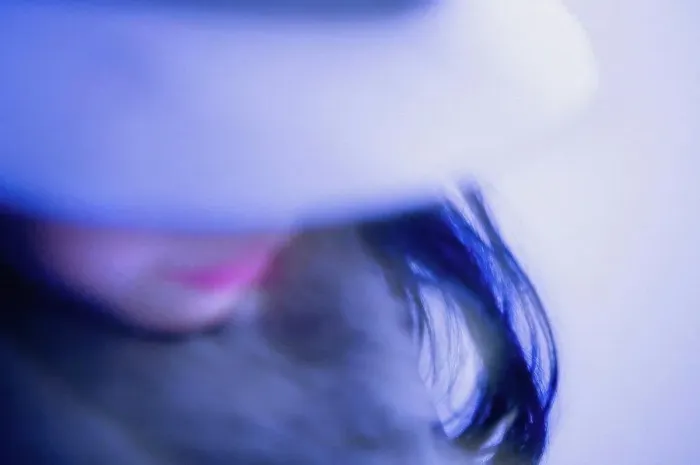 Framed Print : Blurry Blue Girl Wearing Hat Framed Print : Blurry Blue Girl Wearing Hat