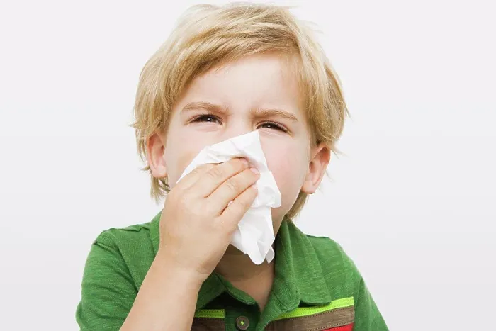 Framed Print : Boy blowing nose Framed Print : Boy blowing nose
