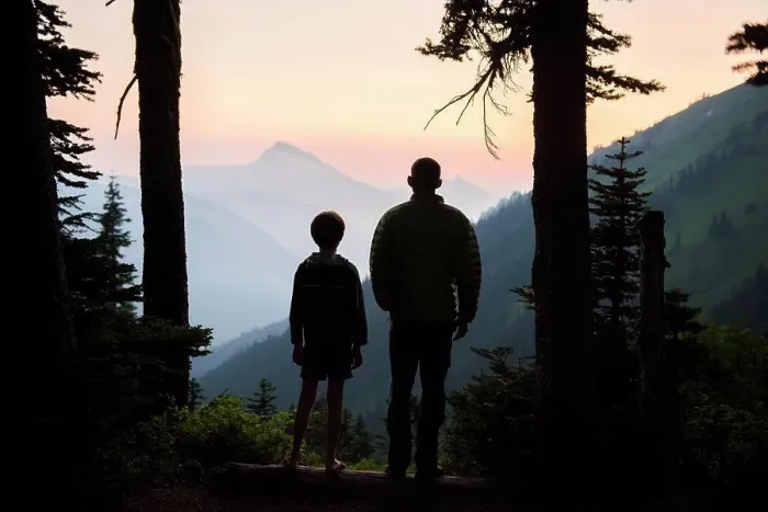 Framed Print : A boy and his dad enjoy the sunset together while camping Framed Print : A boy and his dad enjoy the sunset together while camping