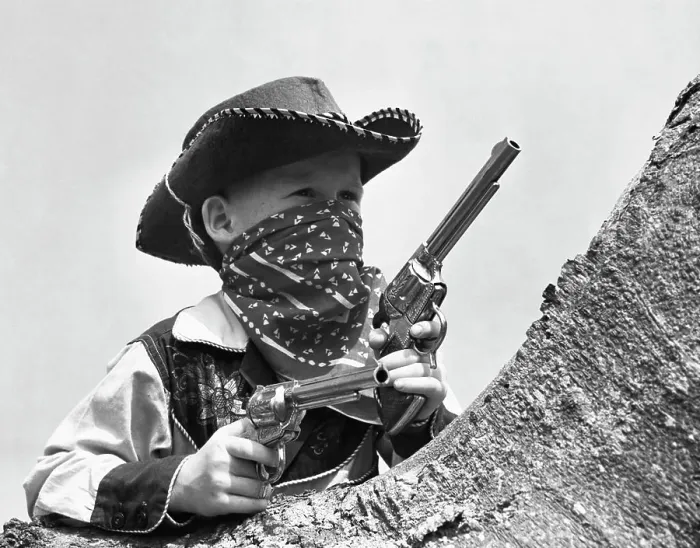 Framed Print : Boy dressed as cowboy
