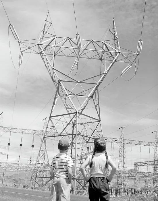 Framed Print : Boy and girl looking at electricity pylon Framed Print : Boy and girl looking at electricity pylon