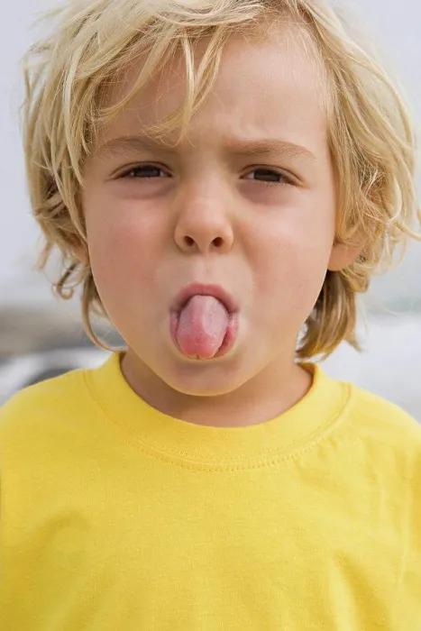 Framed Print : Boy sticking out tongue Framed Print : Boy sticking out tongue
