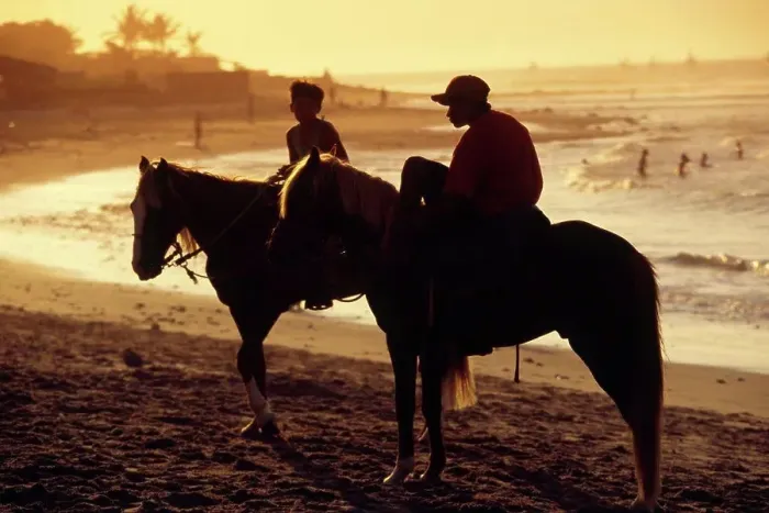 Framed Print : Boys on horseback, on the beach at Mancora, in northern Peru Framed Print : Boys on horseback, on the beach at Mancora, in northern Peru