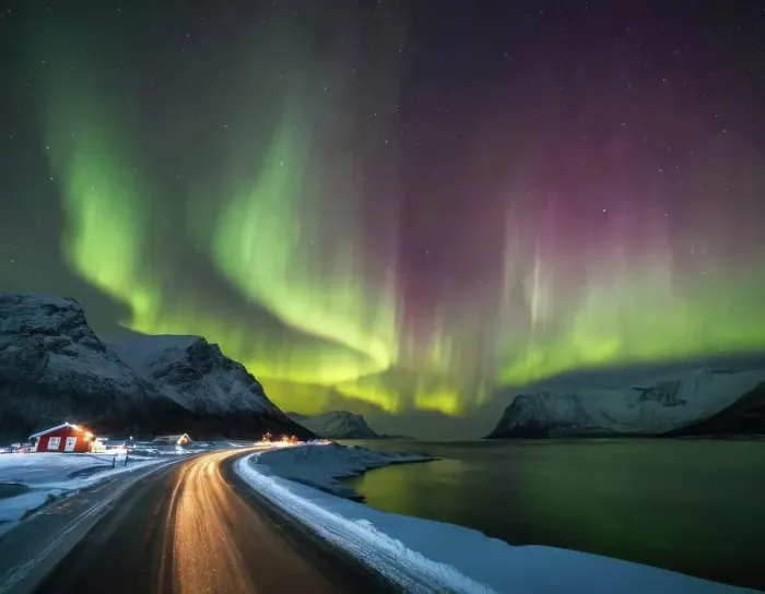 Framed Print : Bright Winter Night In Arctic Norway, Traffic trails at the fjor
