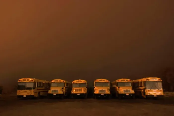 Framed Print : Buses sit in line beneath a brown colored, foggy sky. Auburn California Framed Print : Buses sit in line beneath a brown colored, foggy sky. Auburn California