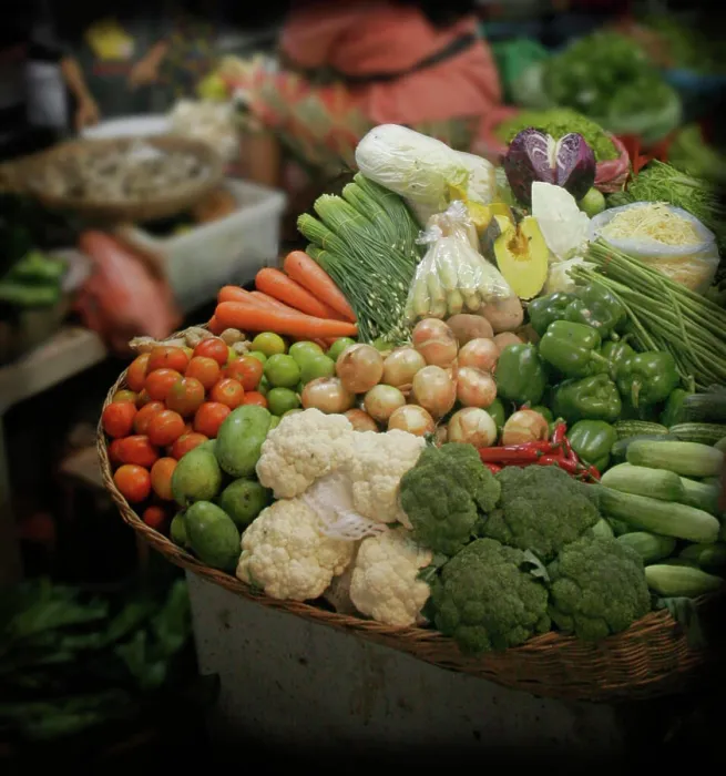 Framed Print : Business goes on at a greengrocer's stall in the wet market, known to locals as Psar Chas, in Siem Reap, Cambodia