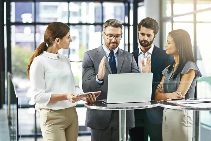 Framed Print : Business man, laptop and meeting with team for presentation of ideas Framed Print : Business man, laptop and meeting with team for presentation of ideas