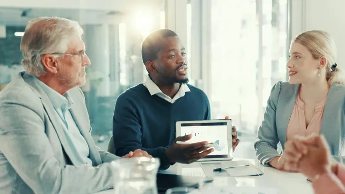 Framed Print : Business people, group and discussion with charts on tablet screen for insurance sales or metrics