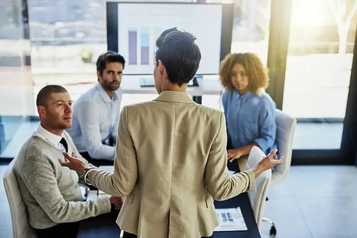 Framed Print : Business person, coach and screen with team in meeting Framed Print : Business person, coach and screen with team in meeting