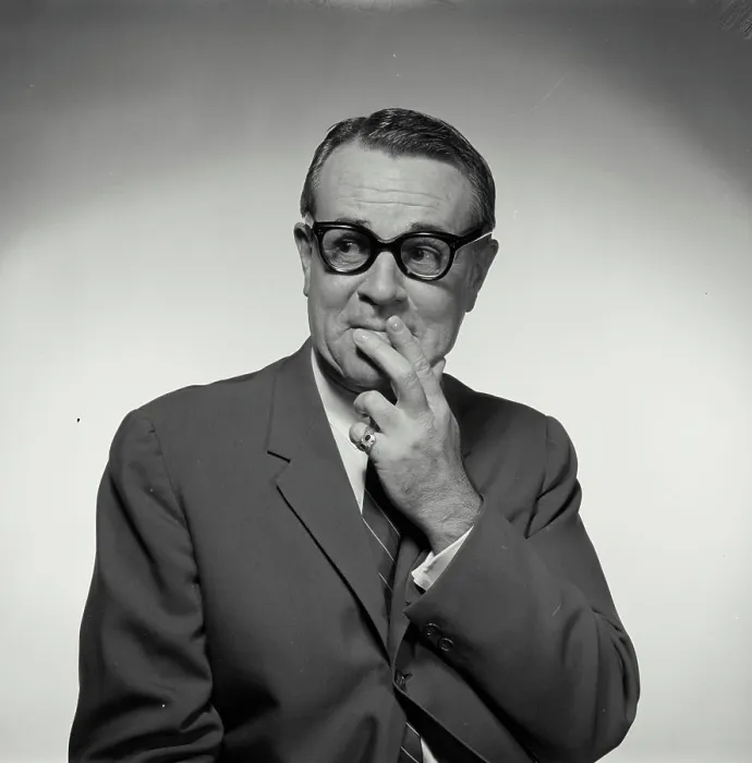 Framed Print : Businessman with his fingers on his lips Framed Print : Businessman with his fingers on his lips
