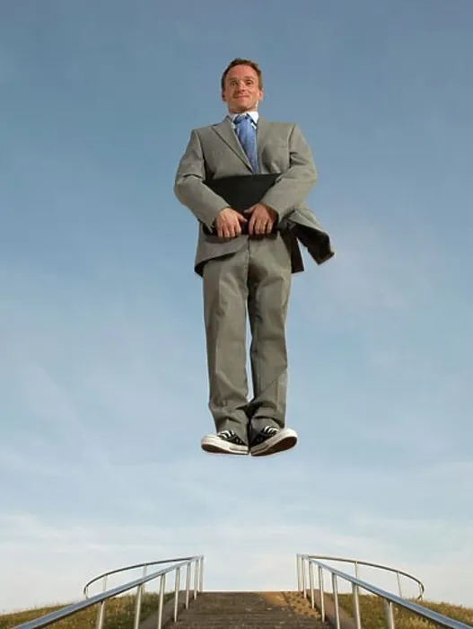 Framed Print : Businessman hovering above the ground