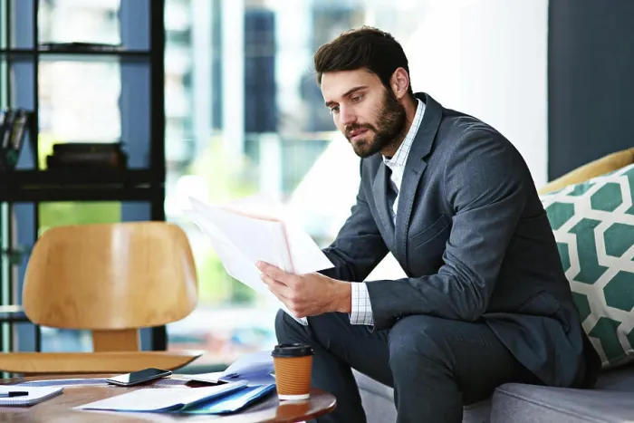 Framed Print : Businessman, lawyer and reading with documents at office for case