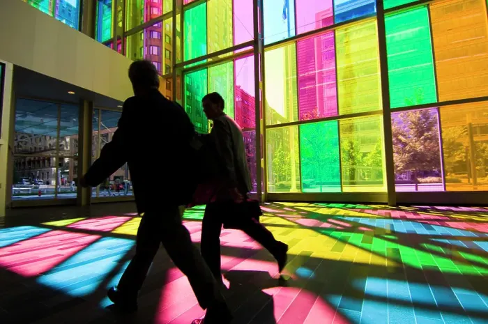Framed Print : Businessmen in sillouette by coloured glass walls of the Palais de Congres de Montreal Montreal convention center