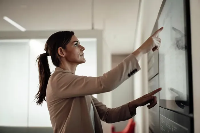 Framed Print : Businesswoman using digital screen and working at office