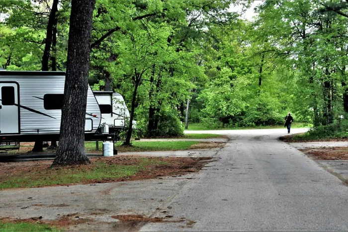 Framed Print : A camper is set up at a campsite May 26