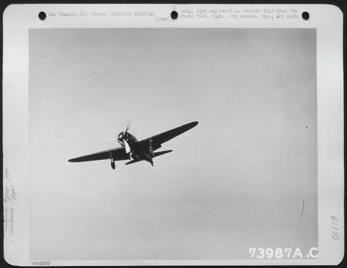 Framed Print : Captured Japaneseanese 'Zero' In Flight Over An Airfield In China. February 1943 Framed Print : Captured Japaneseanese 'Zero' In Flight Over An Airfield In China. February 1943
