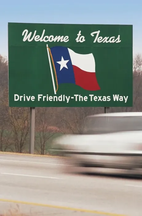 Framed Print : Car driving past Welcome to Texas sign at national border Framed Print : Car driving past Welcome to Texas sign at national border