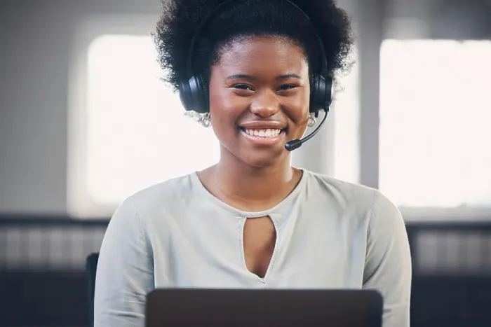Framed Print : Call center, portrait or happy black woman typing in office building startup agency with smile or support Framed Print : Call center, portrait or happy black woman typing in office building startup agency with smile or support