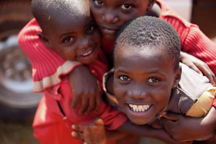 Framed Print : Three Children In An Embrace, Kampala Uganda Africa