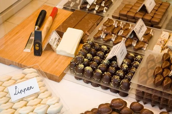 Framed Print : Chocolates in a store, Simon Stevin Plaza, Bruges, Belgium