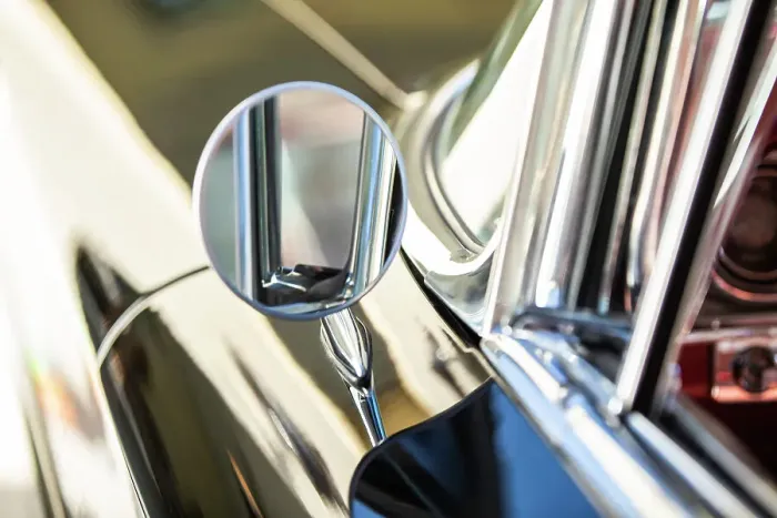 Framed Print : Detail of chrome side mirror on 1960 Oldsmobile Super 88 Holiday Sport Sedan