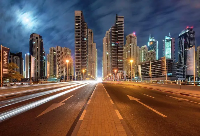 Framed Print : Cityscape with illuminated skyscrapers in Dubai, United Arab Emirates at dusk, highway in foreground Framed Print : Cityscape with illuminated skyscrapers in Dubai, United Arab Emirates at dusk, highway in foreground
