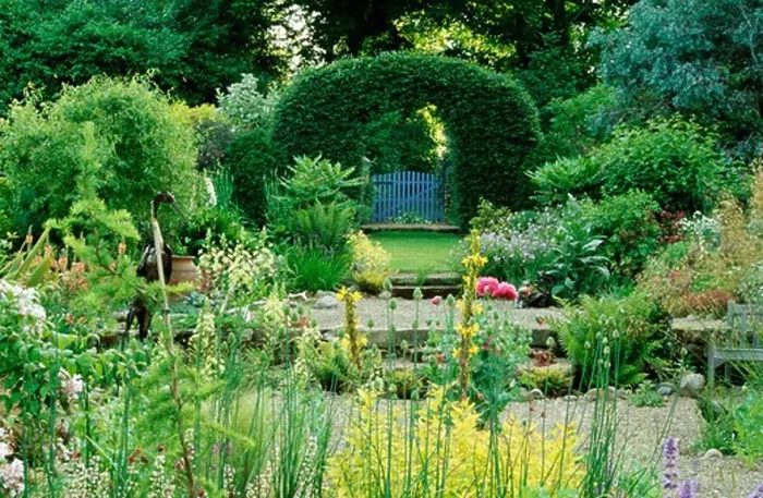 Framed Print : Clipped hedging arch in large country garden in summer Framed Print : Clipped hedging arch in large country garden in summer