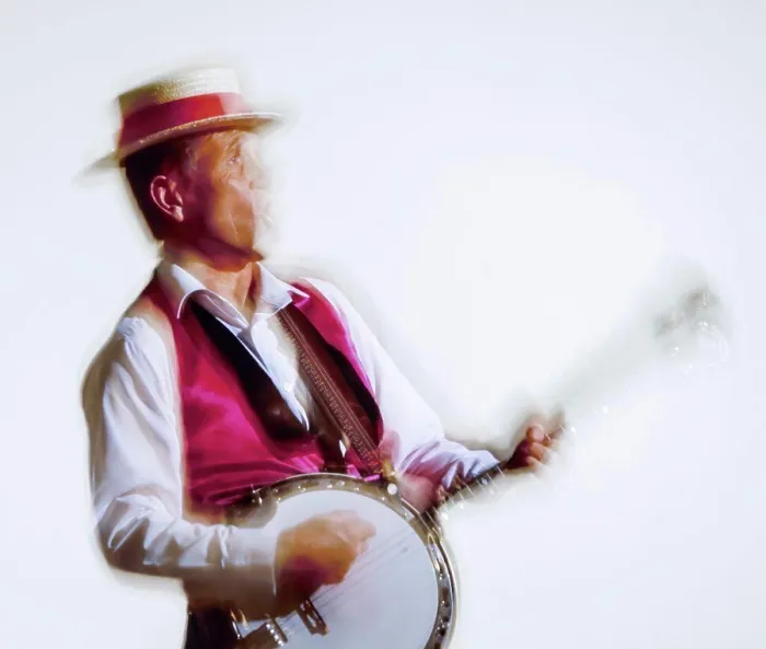 Framed Print : Close up of Dr Jazz playing his banjo and singing - blurred Framed Print : Close up of Dr Jazz playing his banjo and singing - blurred