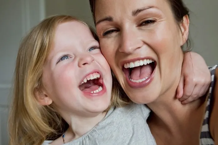 Framed Print : Close up of mother and daughter laughing Framed Print : Close up of mother and daughter laughing